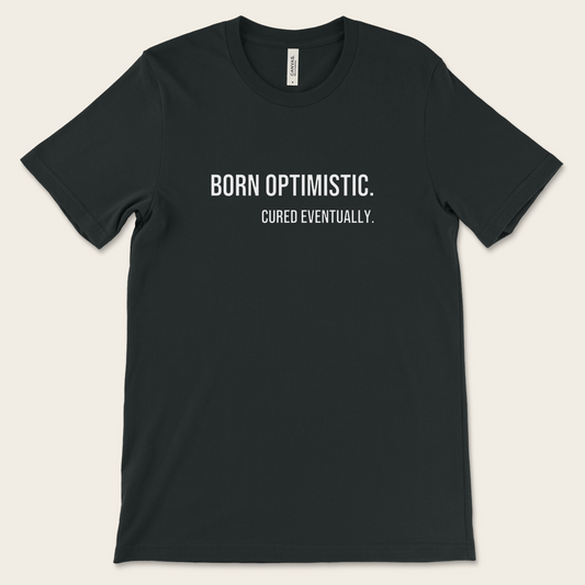 Born Optimistic. Cured Eventually. — Tee